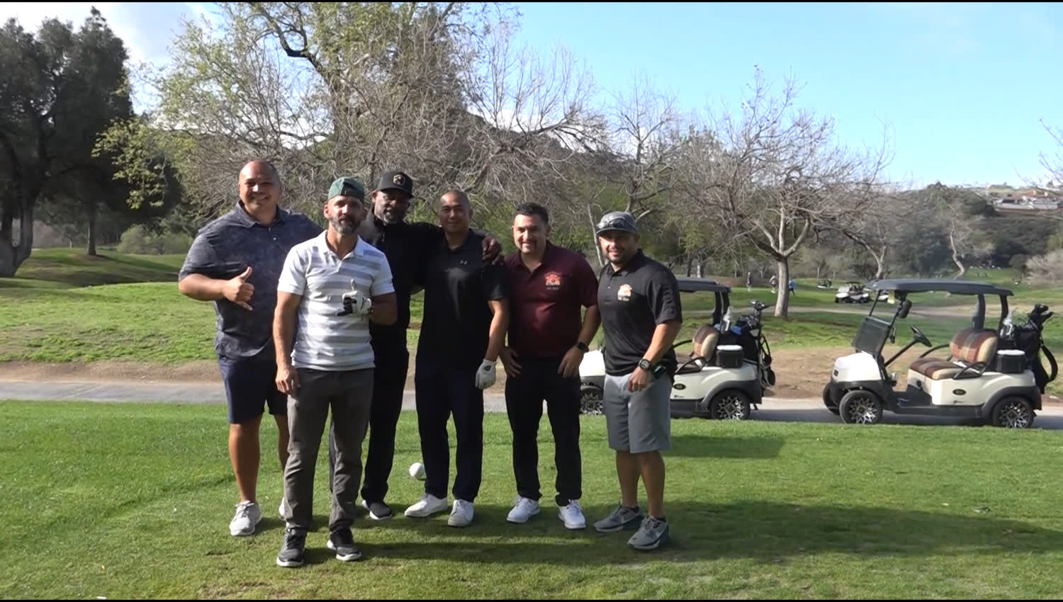 A group of golfers at a MindSet community charity golf tournament